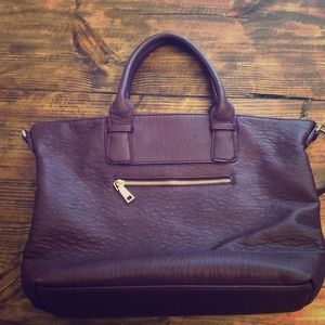 Purple hand bag